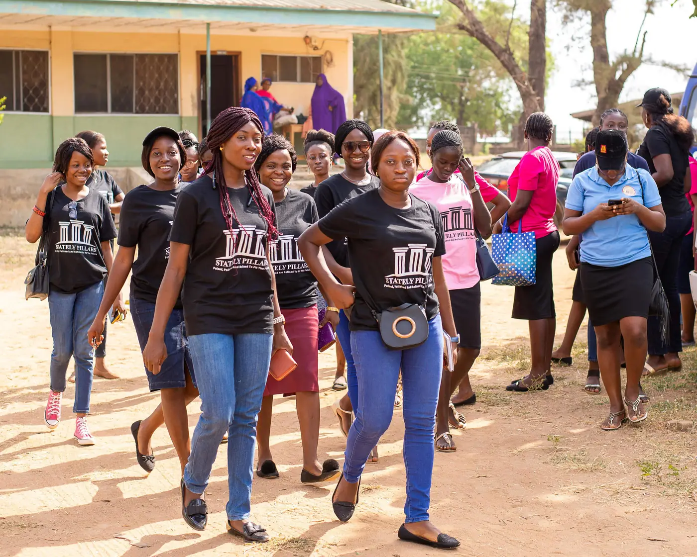 The team walking through the community