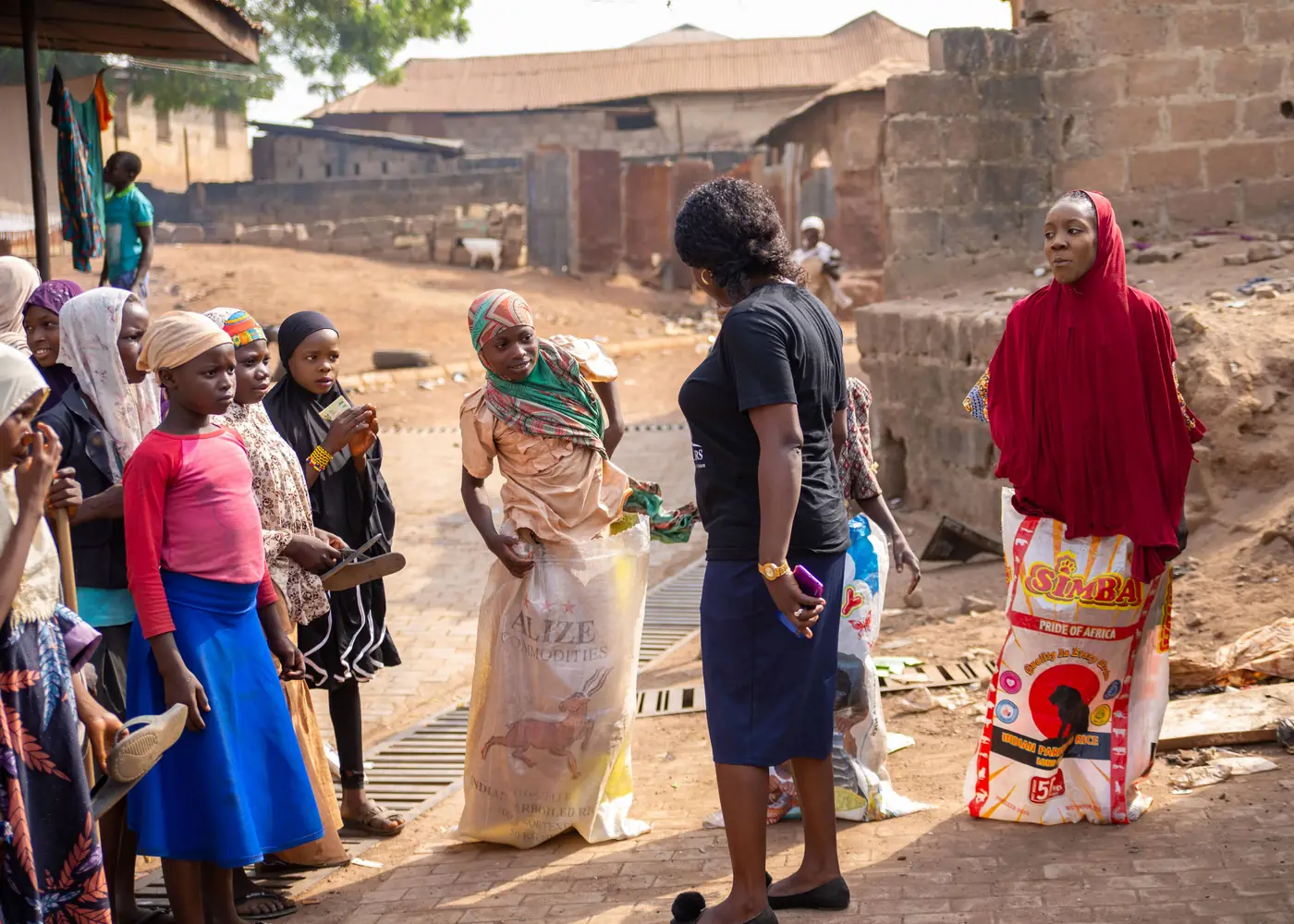Presenting gifts to women in the community