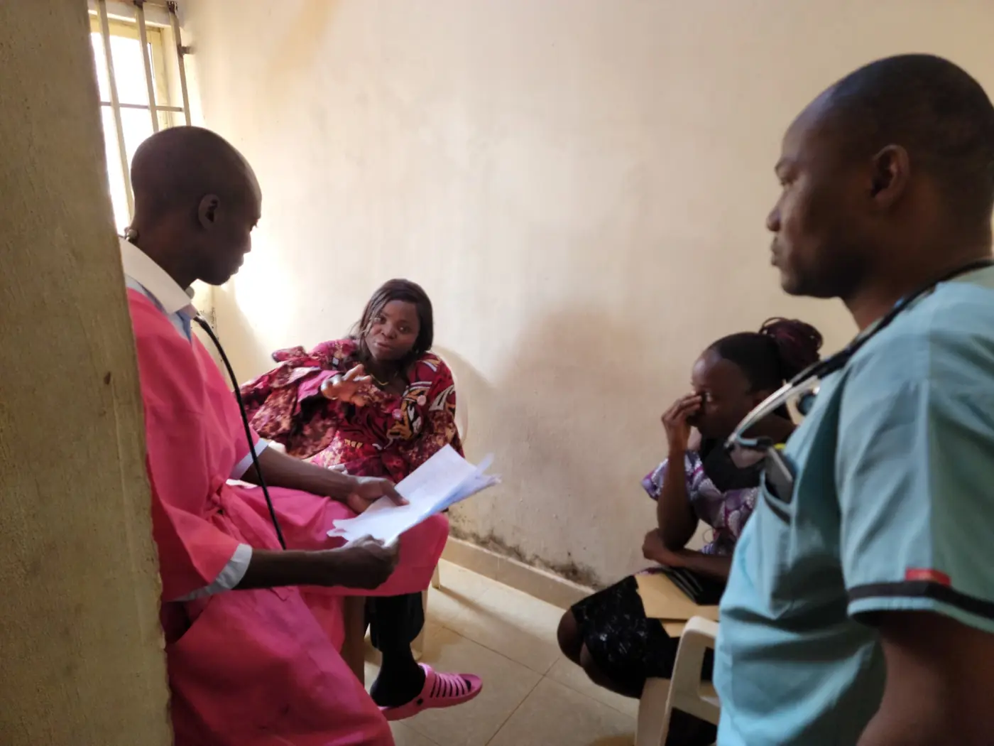 The team speaking with families at the hospital
