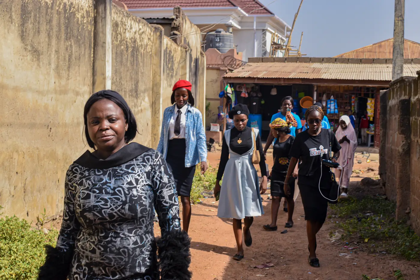 The team walking through the community