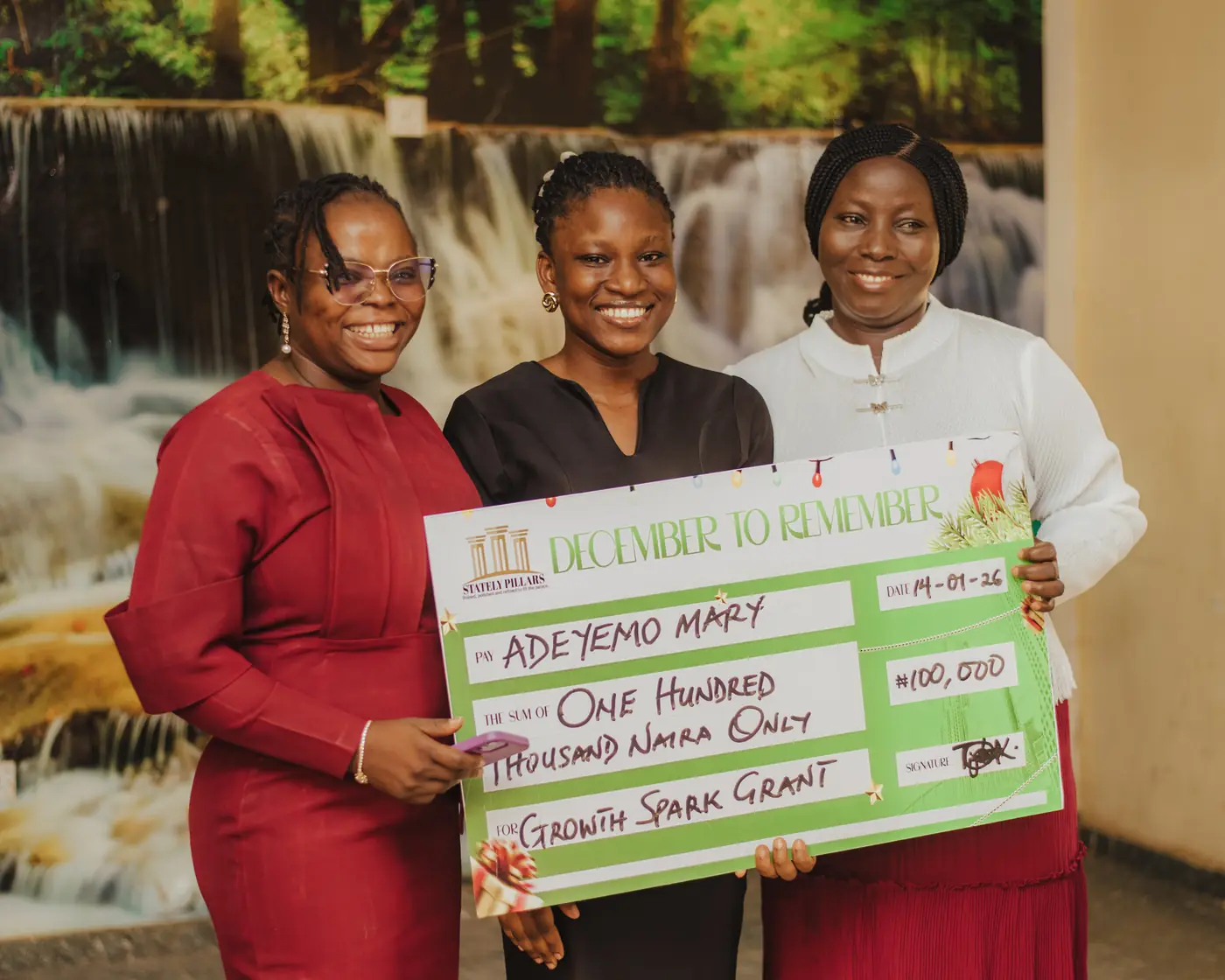 A recipient receiving her Growth Spark grant