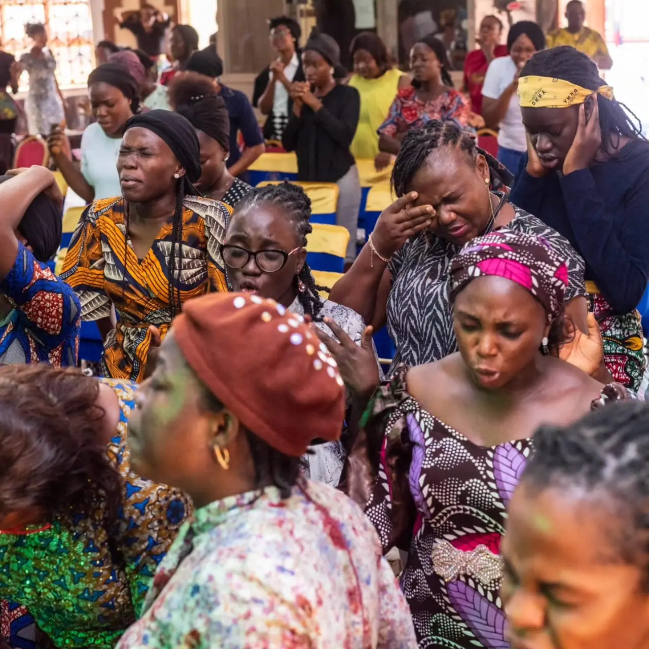 Women in deep prayer
