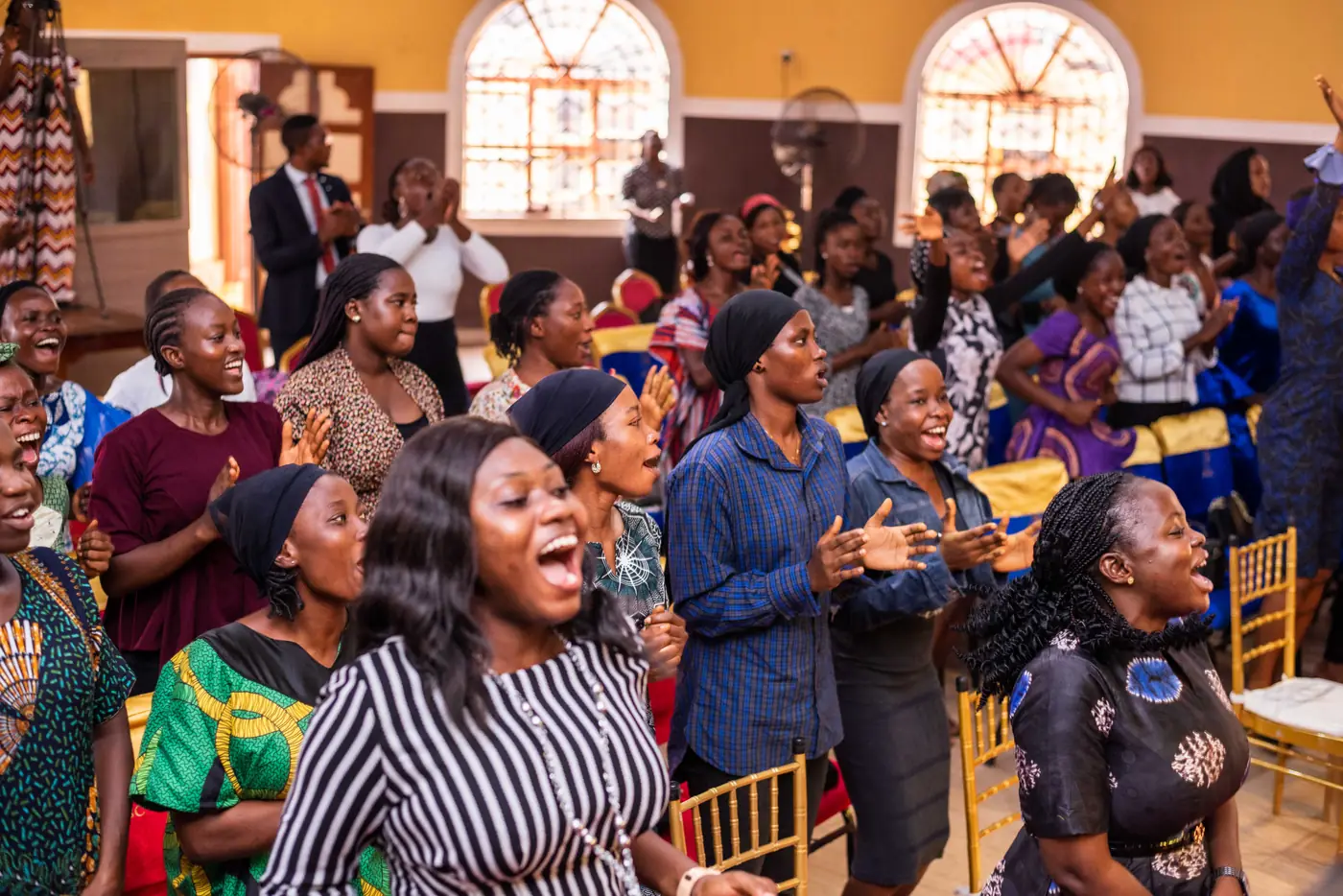 The congregation worshipping