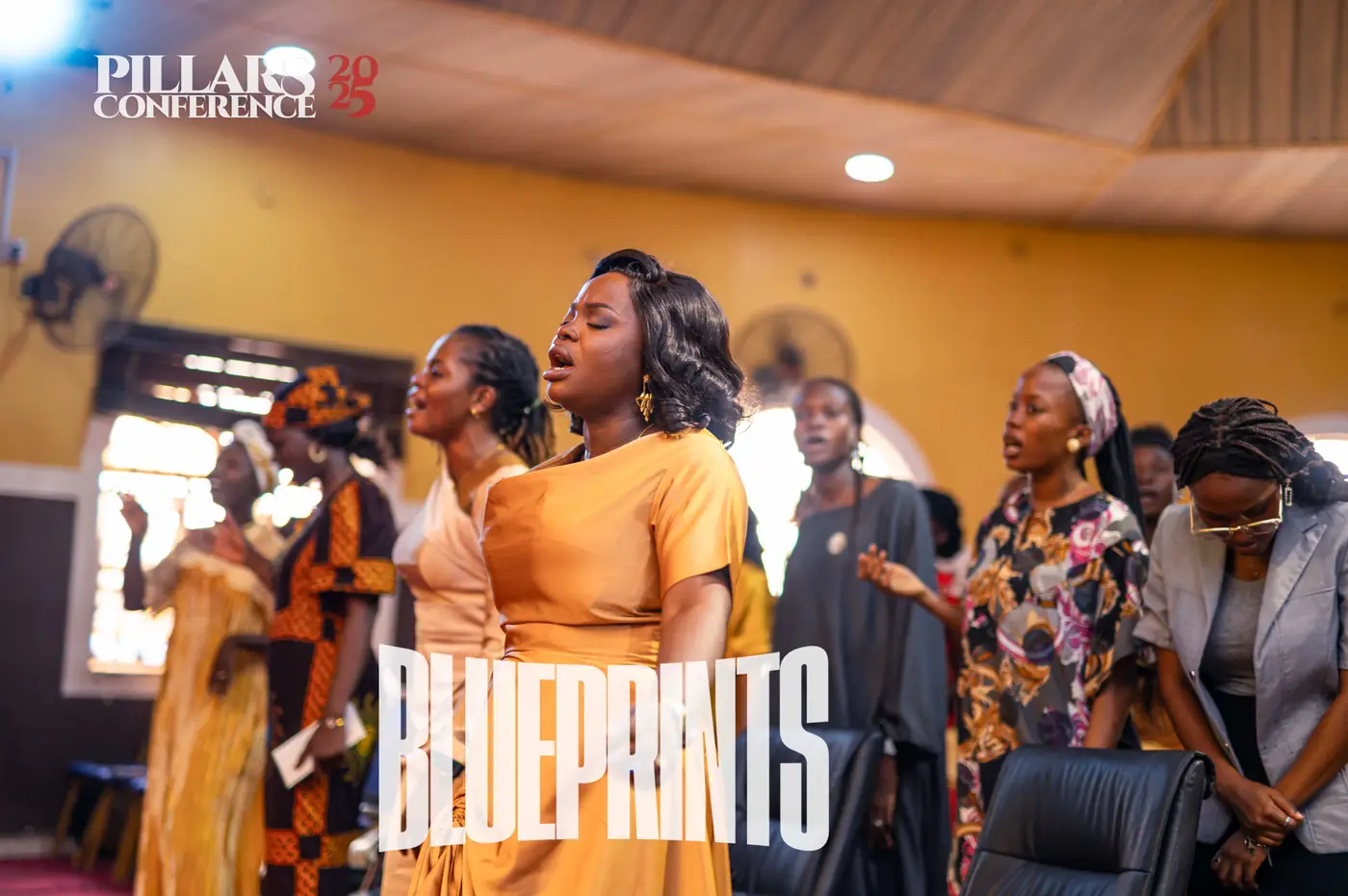 Women singing during a worship session